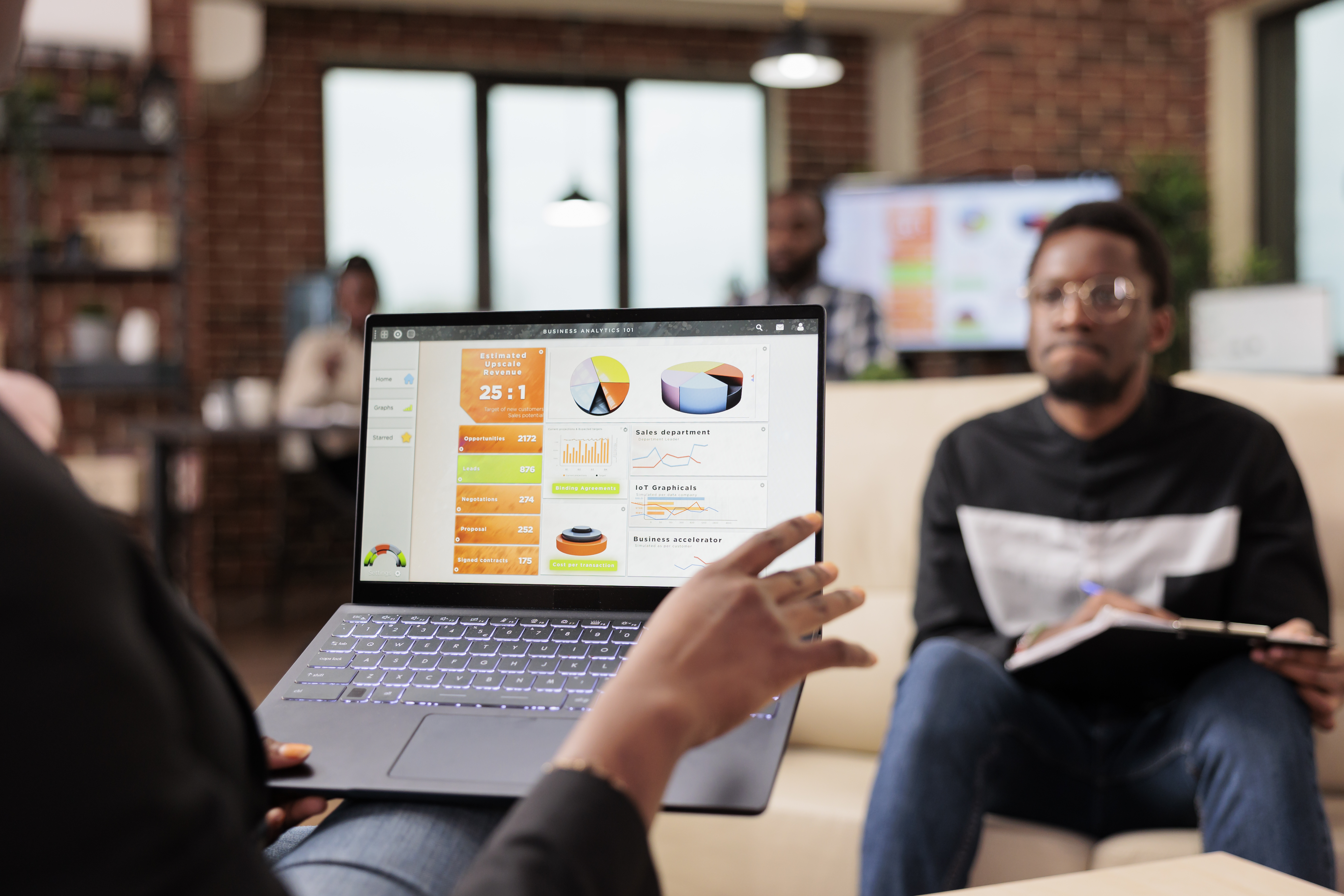 african-american-business-people-analyzing-company-charts-diagrams-laptop-create-startup-presentation-paperwork-report-doing-teamwork-collaboration-plan-research-information.jpg